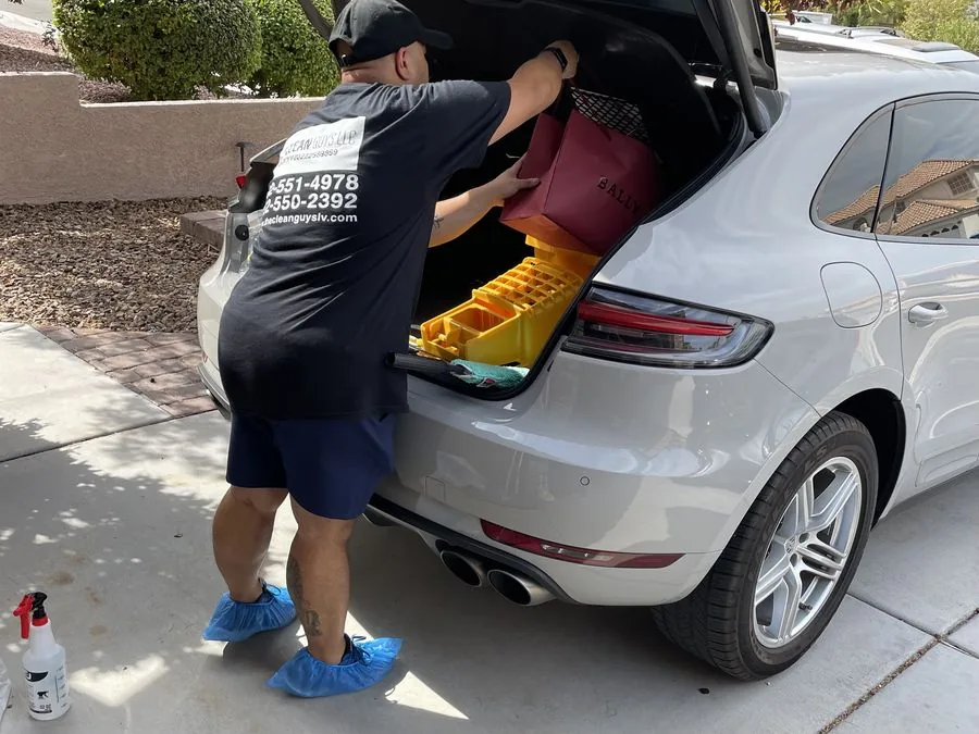 The Clean Guys team member loading supplies at residential Las Vegas home