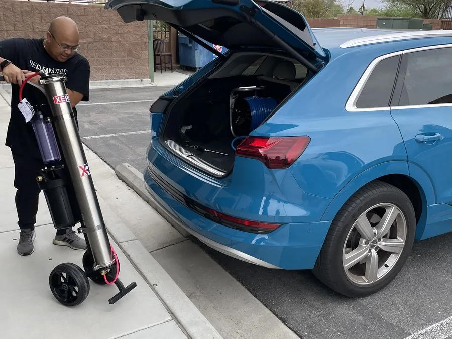 The Clean Guys team member with Xero water filtration system Las Vegas