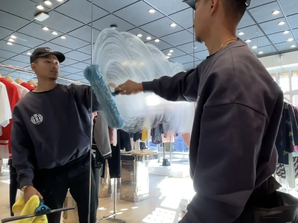 Cleaning mirrors and display glass at a Las Vegas retail store